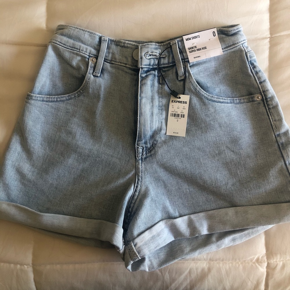 Super high waisted denim mom shorts.